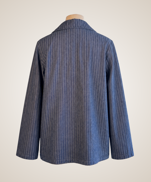 A blue and gray vertically striped wool-blend blazer shown from the back on a mannequin, set against a plain beige background.